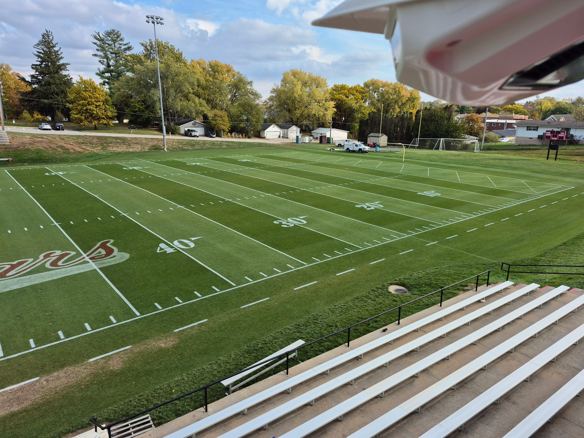 Striped football field from the stands